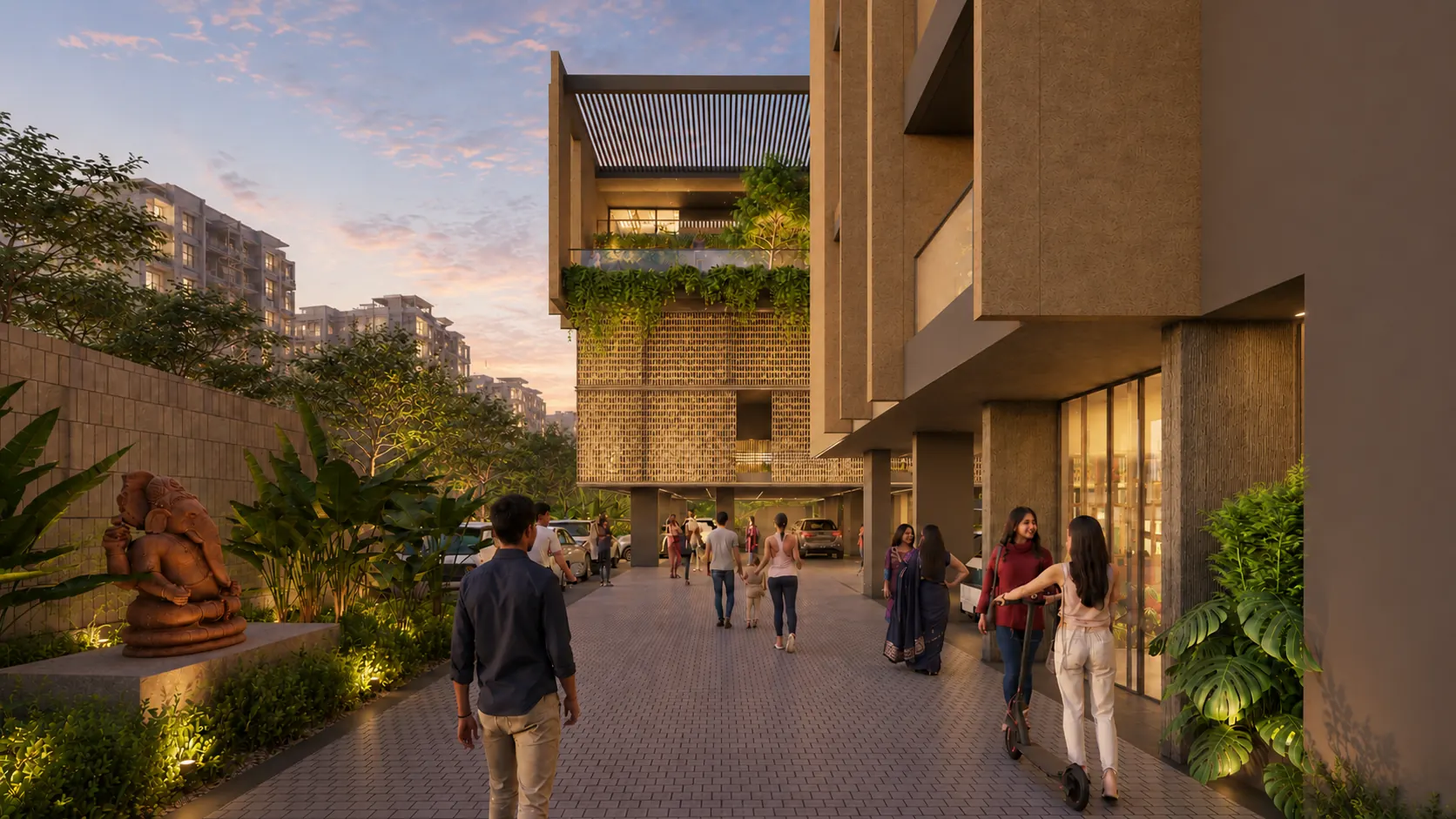 Landscaped walkway between the buildings at dusk