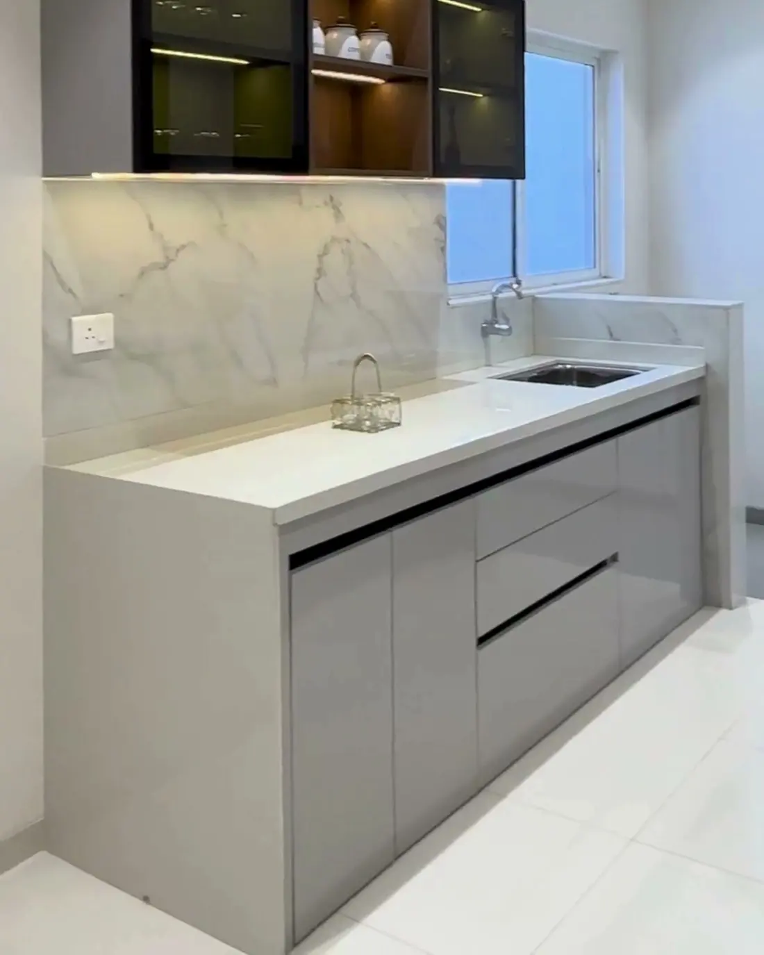 Kitchen with a marble-look counter