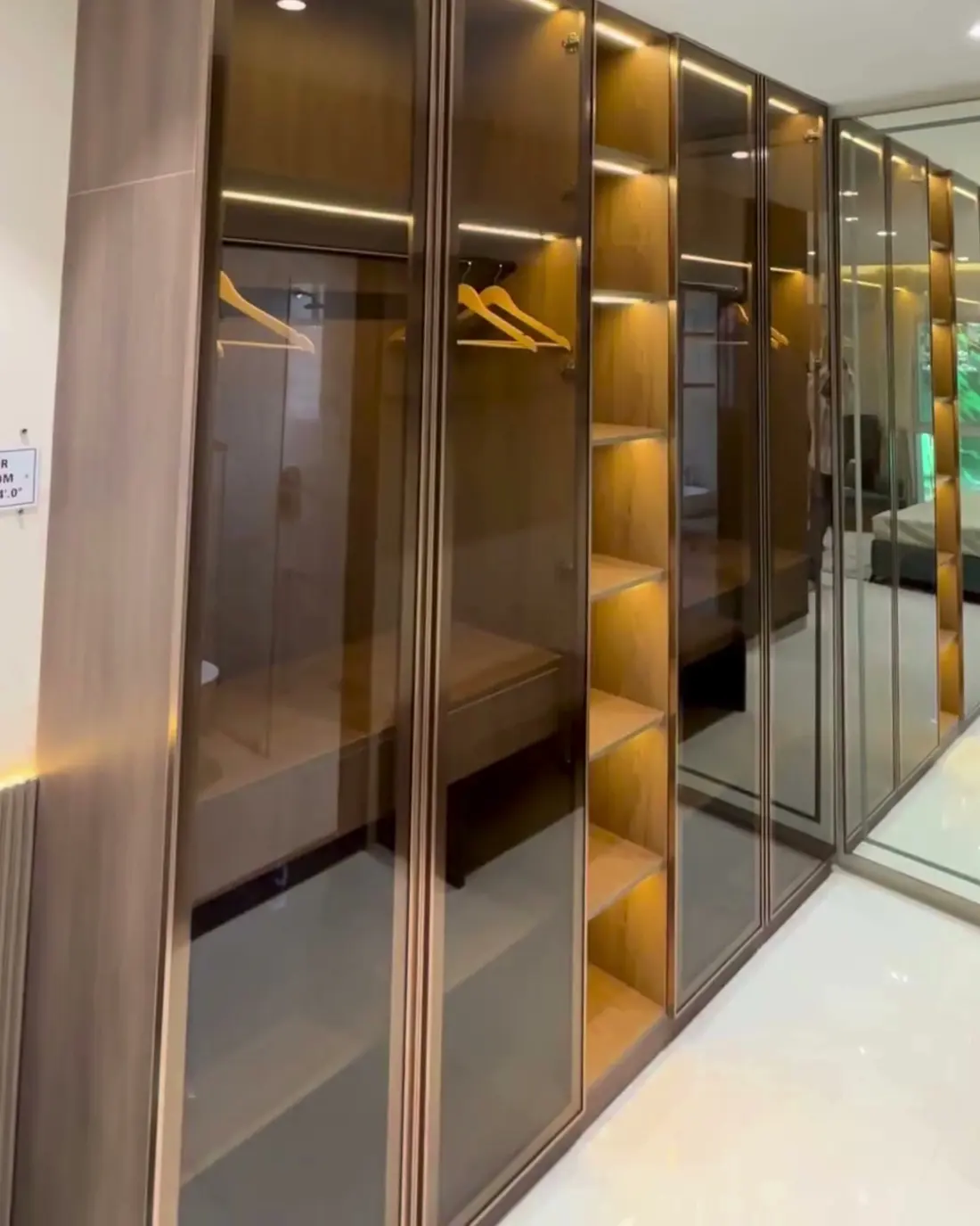 Glass-fronted wardrobe in the master bedroom